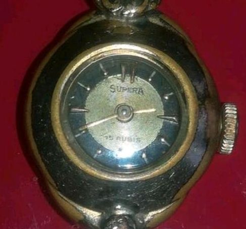 Uhr Brosche Supera Uhrenbrosche vergoldet 15'Rubis in Nehms