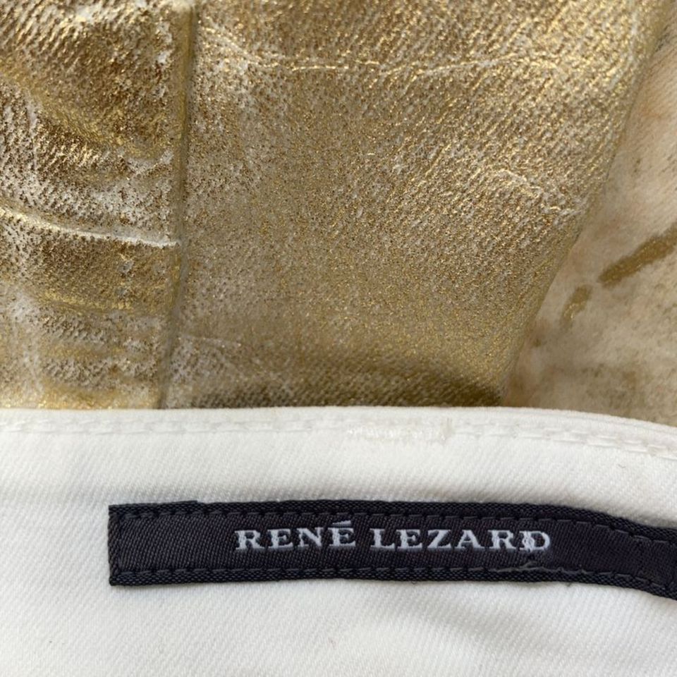 Goldfarbene Jeans der Luxusmarke Rene Lezard mit Blumenaufdruck in Nürnberg (Mittelfr)