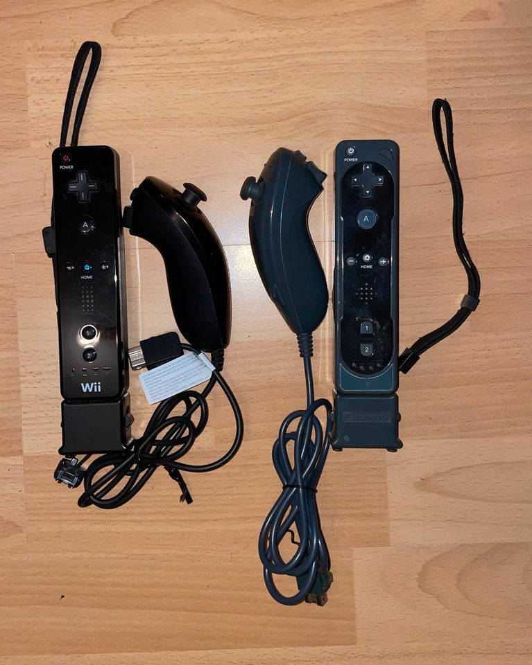 Nintendo Wii Konsole mit Zubehör und Spielen in Olpe