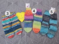Handgestrickte Babysöckchen 6 bis  9 Monate 4fach Sockenwolle Nordrhein-Westfalen - Leverkusen Vorschau