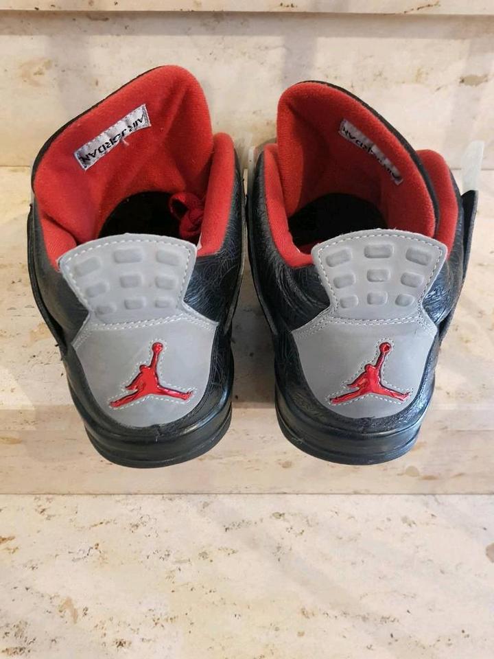 Black laser jordan 4 sales