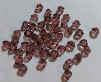 2 Tüten Swarovski ® Kristalle 4mm Doppelkegel alt rosa Schimmer Niedersachsen - Bockenem Vorschau