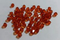 7 Tüten Swarovski ® Kristalle 4mm Doppelkegel rot Orange braun Niedersachsen - Bockenem Vorschau