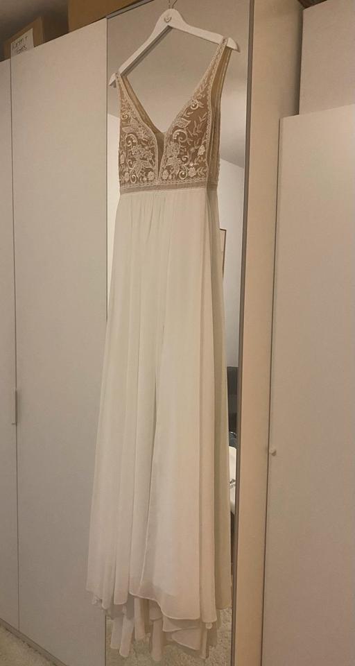 Brautkleid mit Tattoospitze *profesiionelle Reinigung* in München