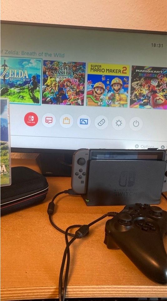 Nintendo Switch - mit Zubehör und Spiel in Bedburg-Hau