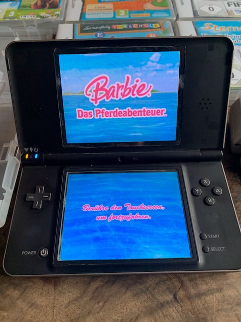 Nintendo DS XL mit Nintendo Ladegerät und Spielen gebraucht in Elmenhorst Kr Stormarn