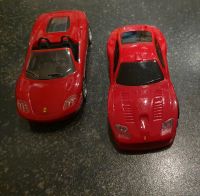 2 Ferrari aus Kunststoff mit Rückziehmotor Niedersachsen - Osnabrück Vorschau