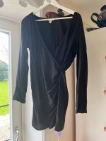 H&M mini Kleid 38 schwarz Wickeloptik Schleswig-Holstein - Tetenbüll Vorschau