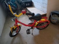 Puky 12 Zoll Kinderfahrrad in rot/gelb Schleswig-Holstein - Glinde Vorschau