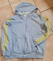 So cool! Adidas Sweatjacke Hoodie grau mit gelben Streifen M 164 Niedersachsen - Aurich Vorschau