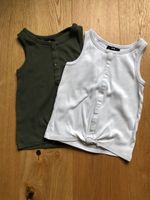 2 Stück C&A Shirts/-Tops grün und weiß Größe 146/152 Nordrhein-Westfalen - Essen-Fulerum Vorschau