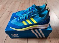 Schuhe - von Adidas - Gr. 44 - blau - gelbe Streifen Berlin - Reinickendorf Vorschau