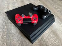 PlayStation 4 Pro mit zwei Controllern - rot und schwarz Schwerin - Krebsförden Vorschau