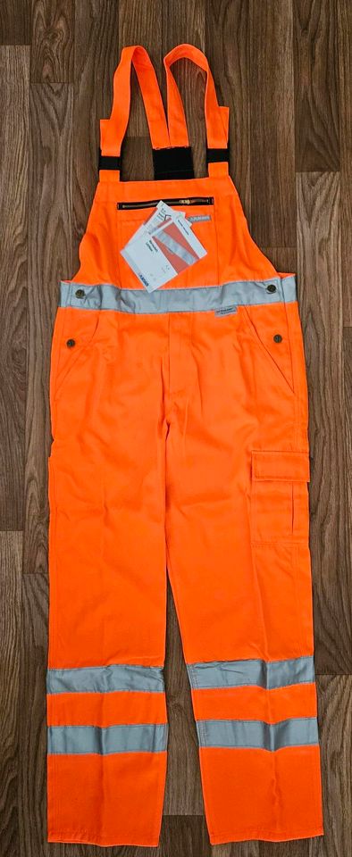 Planam Warnschutz Latzhose uni Orange 25 26 27 48 50 54 58 in Borna