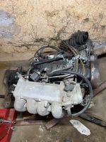 VW 1.8 GX Motor mit Kat, Downpipe, Getriebe und Antriebswellen Bayern - Helmstadt Vorschau