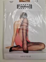 Wolford Strumpfhose neu, Gr. L, beige mit Mini Fleurs in Schwarz Hessen - Bad Vilbel Vorschau