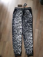 Roberto cavalli gym Gr. 36 italienische 42 Animal print Nordrhein-Westfalen - Warstein Vorschau