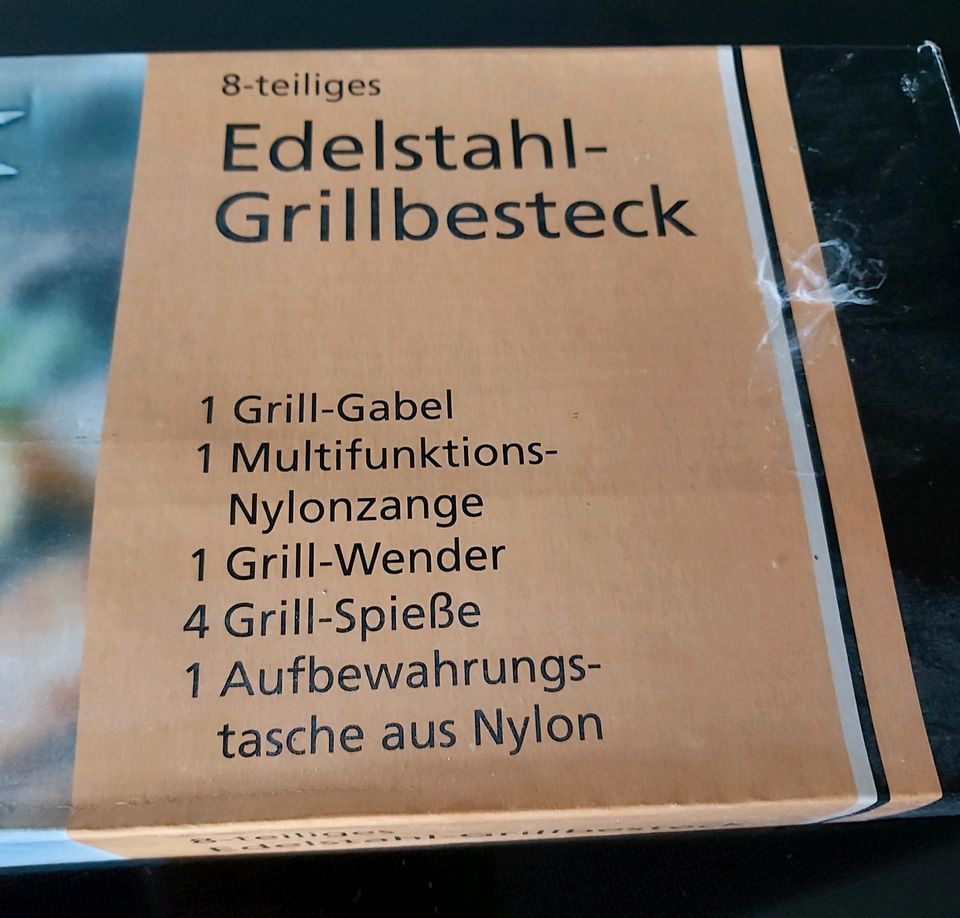 Edelstahl Grillbesteck 8teilig fast neu OVP in Gaukönigshofen