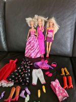 3 Barbies mit verschiedener Kleidung Niedersachsen - Katlenburg-Lindau Vorschau