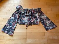 Verkaufe sehr gut erhaltene Bluse von H&M Gr. 34 grau mit Blumen Thüringen - Steinbach-Hallenberg (Thüringer W) Vorschau
