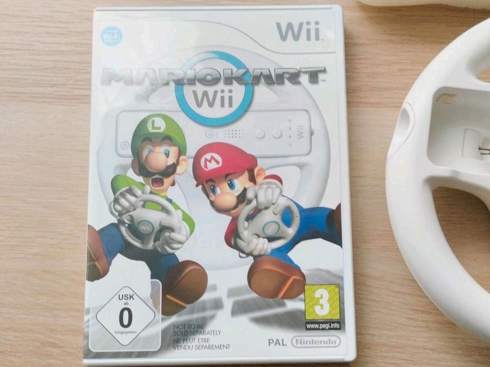 NintendoWii MarioKartVideospiele inclusive 1Lenkräder 1Controller in Leer (Ostfriesland)