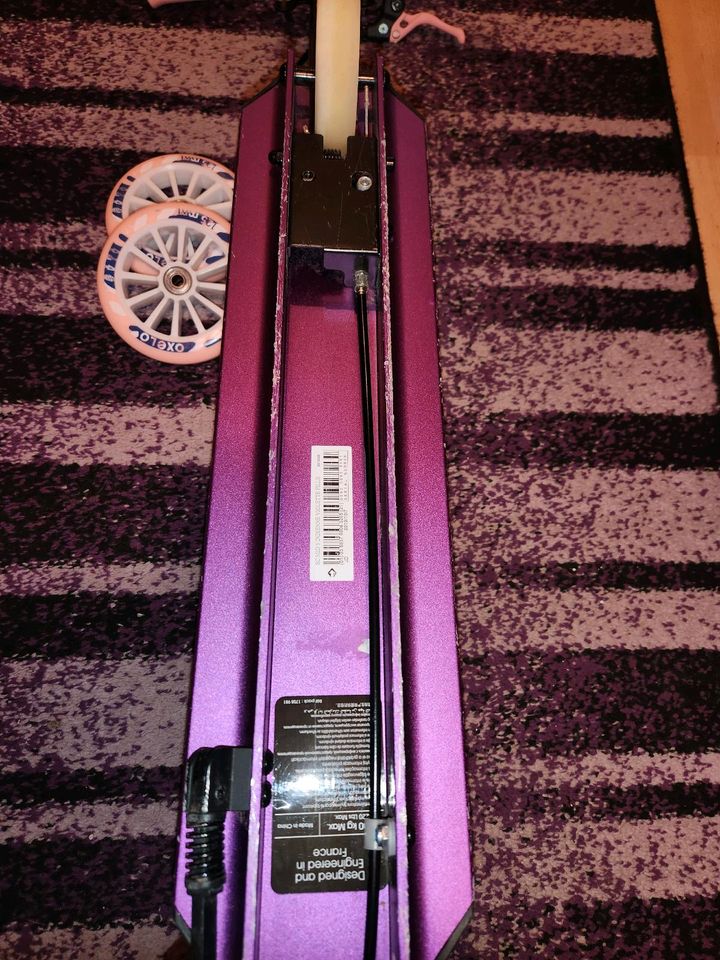 Roller Oxelo Mid 5 violett mit Leuchträder in Berlin