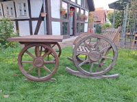 Gartenmöbel Set aus Tisch und Schaukelstuhl mit Wagenrad. Niedersachsen - Barsinghausen Vorschau