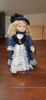 Porzellanpuppe mit blonden Haaren und blauem Kleid Niedersachsen - Schortens Vorschau
