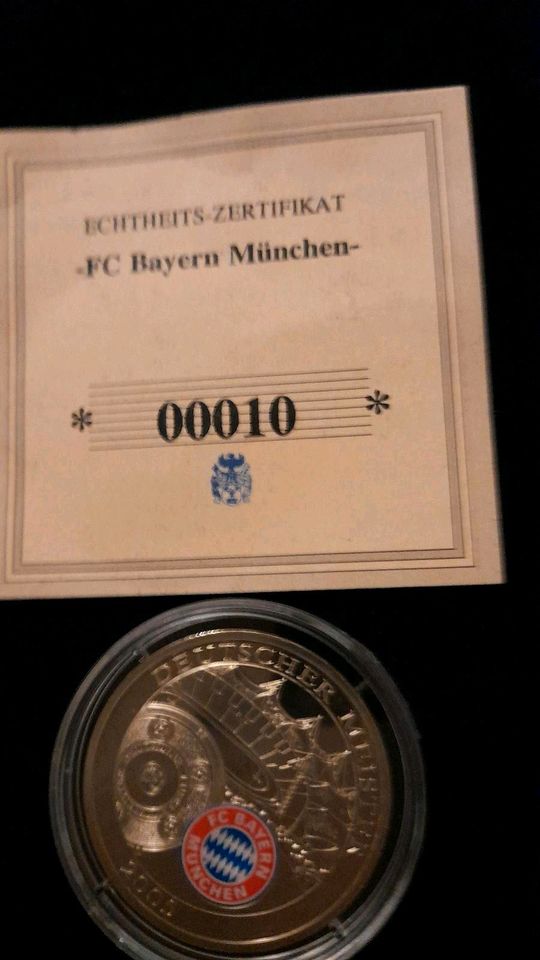 Münzen des FC Bayern, incl. 2 Goldmünzen in Saarbrücken