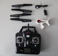 Drohne Ersatzteile Syma X5SC Fernbedienung Propeller USB Kabel Sachsen - Coswig Vorschau