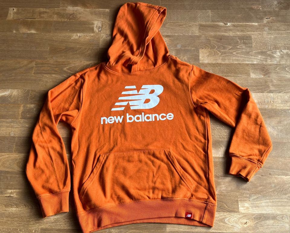NB New Balance Hoodie Sweatshirt Gr. 164* Junge orange in Bocholt