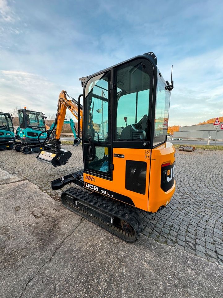 Mieten Minibagger JCB 19C-1 mit Mulcher Bagger Mieten Leihen Baumaschinen Vermietung in Meisenheim