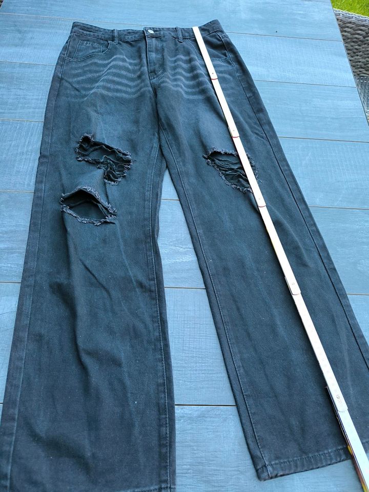 Schwarze Jeans in Größe XL mit Löchern in Haan