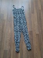 Schwarz weißer Jumpsuit Nordrhein-Westfalen - Bedburg Vorschau