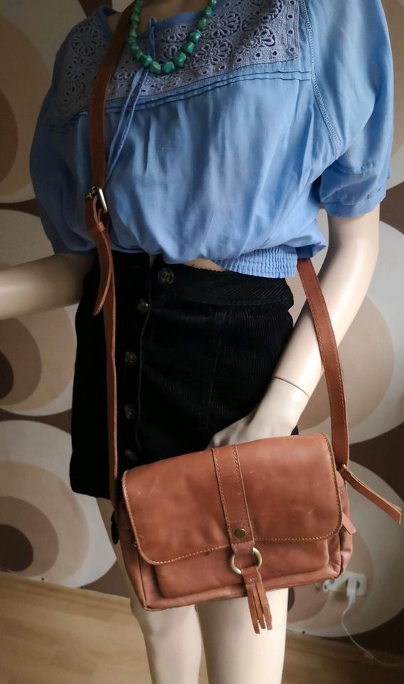 Leder-Handtasche, Saddle Bag, Quaste, cognac-braun in Köln