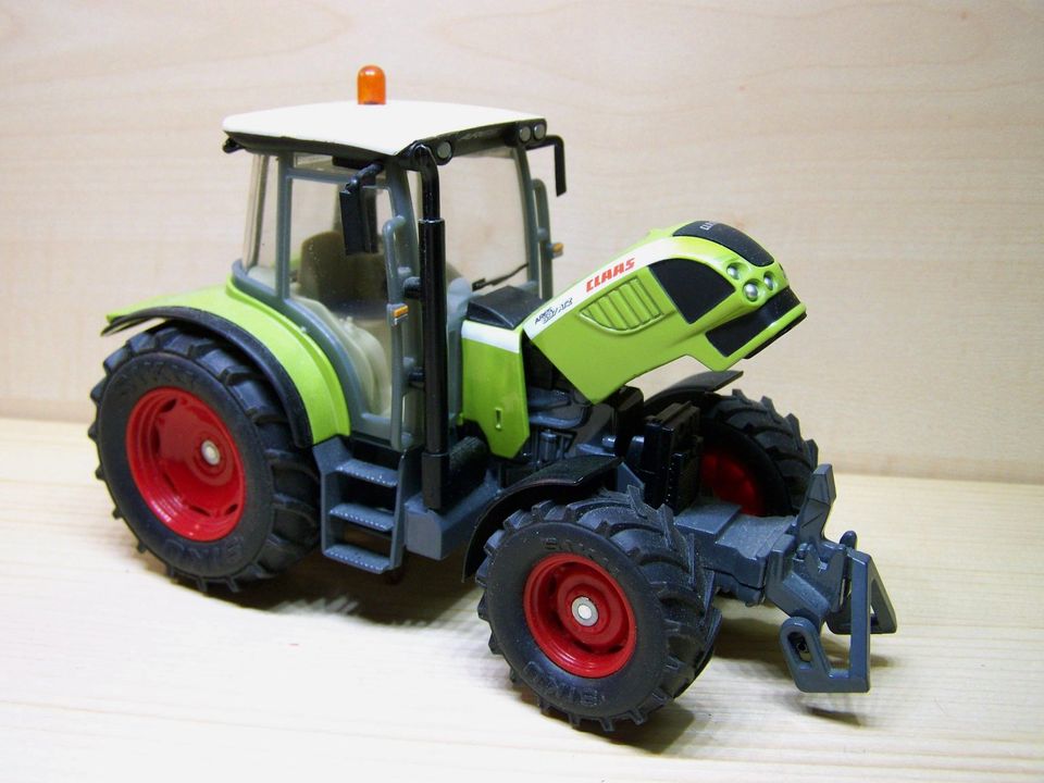 Siku 3256 Claas Ares 697 ATZ Trecker 1/32 neu 2 St. vorh. je 24,- in Steinhöfel