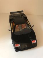 Modellauto Lamborghini Bburago 1/18 schwarz L 23cm Niedersachsen - Schiffdorf Vorschau