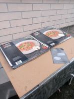 2x Pizza Stein 38cm Durchmesser, 1x neu,1x gebraucht Nordrhein-Westfalen - Netphen Vorschau