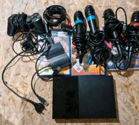 Playstation 2 mit Singstar 4 Mikrofone 1 Controller + Zubehör Nordrhein-Westfalen - Vlotho Vorschau