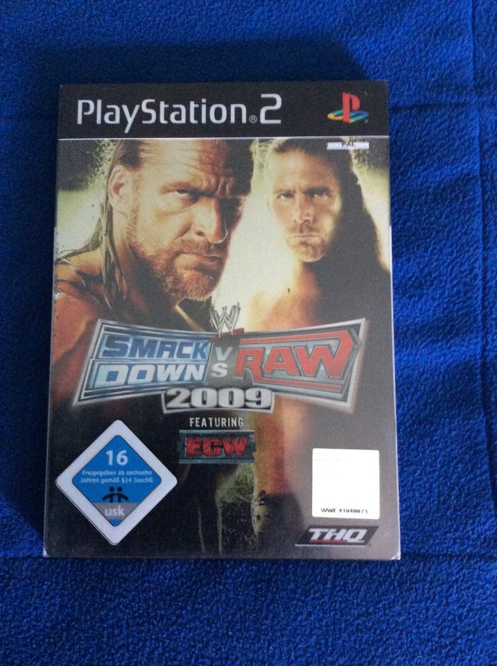 PSP / Playstation 2 / Smackdown versus Raw / 2009 / Steelbook in Polch