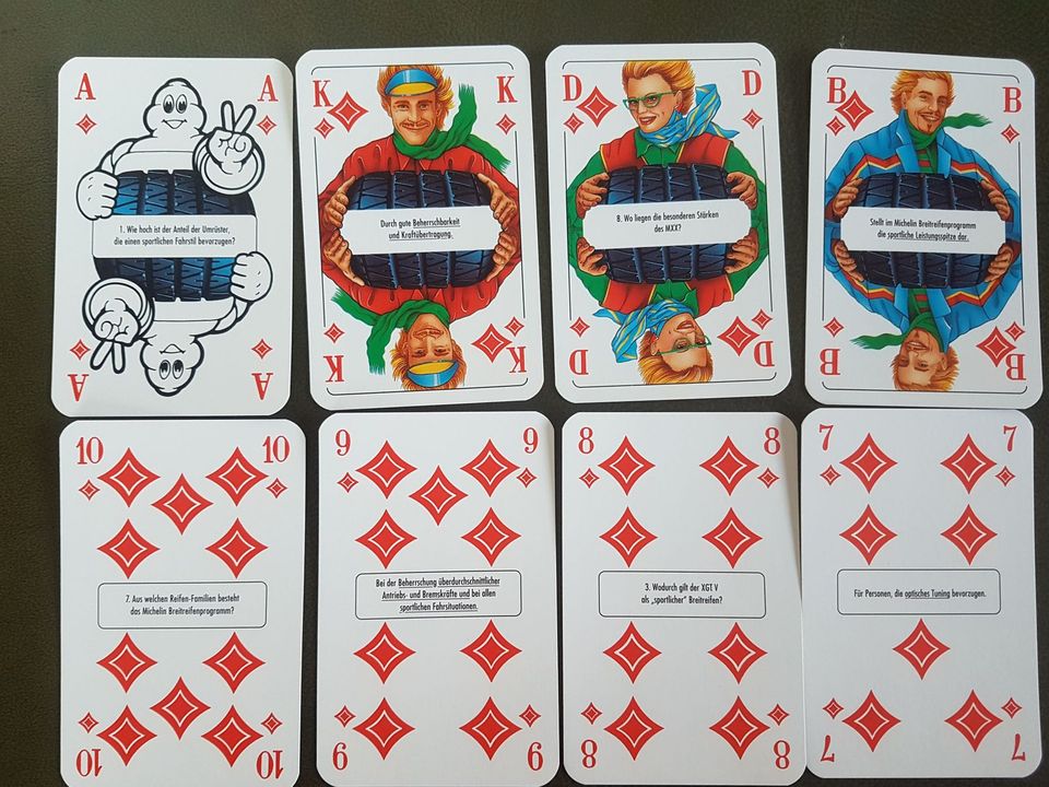 Spielkarten mit Werberückseite „Michelin“ und Fragen auf Karten in Neuburg am Inn