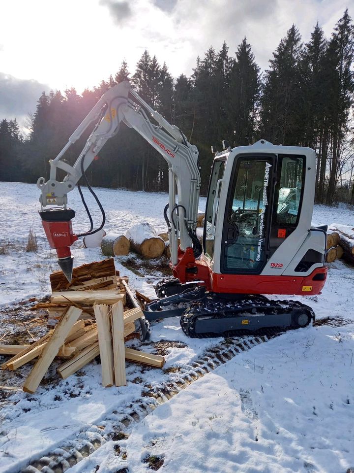 Bagger mieten mit Kegelspalter oder Fällgreifer in Plankenfels