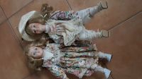 Zwei Puppen mit Porzellanköpfe Niedersachsen - Hatten Vorschau