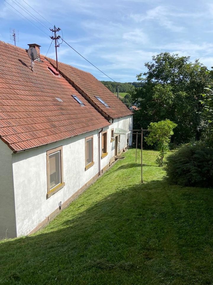 Haus für 1-2 Familien mit Garten und 2 Garagen in Dennweiler-Frohnbach