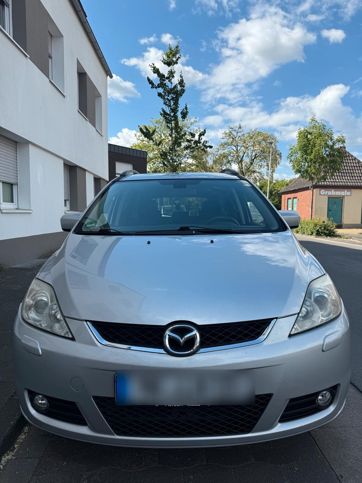 Abbildung des Autos Mazda 7 setze TÜV 2027