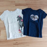 2 Mädchen T Shirts Pferde blau weiß 128 zusammen nur 2€ Brandenburg - Neuruppin Vorschau