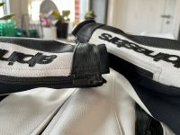 AlpineStars Motorradanzug 48 Lederanzug schwarz weiß Top Nordrhein-Westfalen - Ennigerloh Vorschau