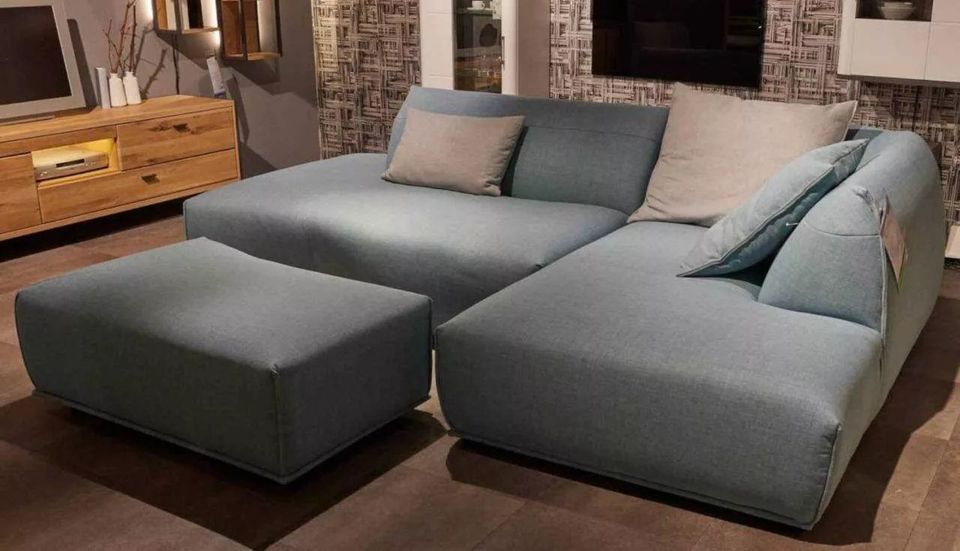 Gutman Factory Design Sofa Afterwork in "Eis-blue" mit Hocker in Esens
