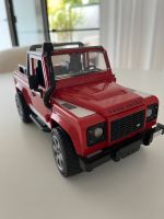 Bruder Jeep Land Rover Defender rot Niedersachsen - Rosengarten Vorschau