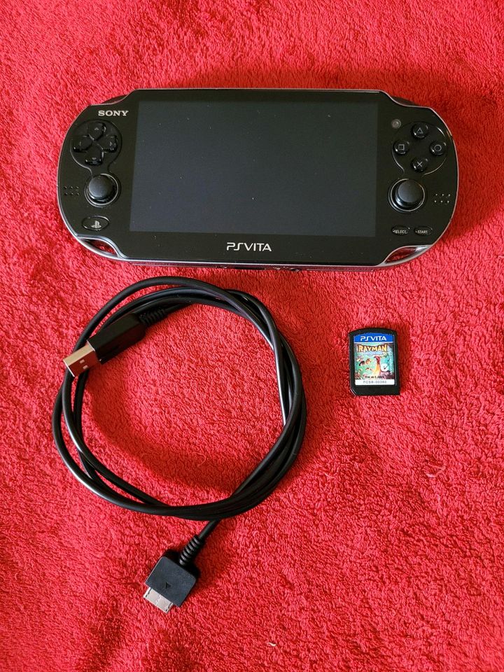 Playstation Vita mit Ladekabel + Spiel in Bad Herrenalb